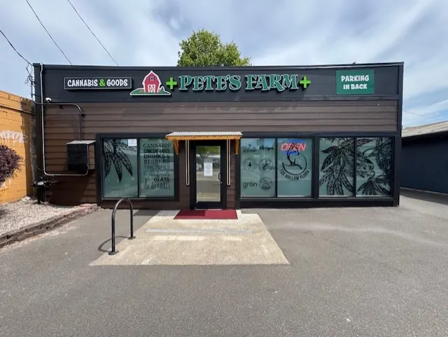 Commercial storefront with new dark wood-look exterior siding
